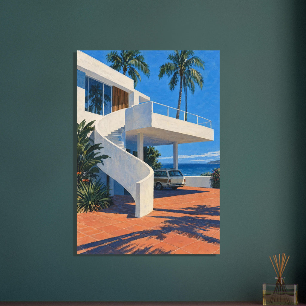 White coastal villa with a curved staircase, palm trees, a parked estate car and terracotta paving beside blue sea.