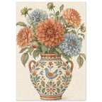 Terracotta and blue dahlias with green leaves in a two-handled vase decorated with flowers and a bird on cream.