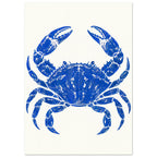 Ultramarine blue crab with raised claws and distressed detailing, centred on a warm cream background.