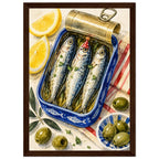 Three sardines in an open blue tin, one wearing a red party hat, surrounded by lemon wedges, olives and striped cloth.