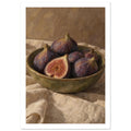 Purple figs, one halved, in an olive-green bowl on folded cream cloth against a brown, visibly brushworked background.