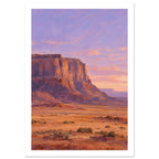 Terracotta desert cliffs above a scrub-covered plain, with distant mesas beneath a lilac and peach sky.
