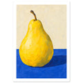 Yellow pear with a curved brown stem on a cobalt-blue tabletop, casting a dark shadow against a cream background.