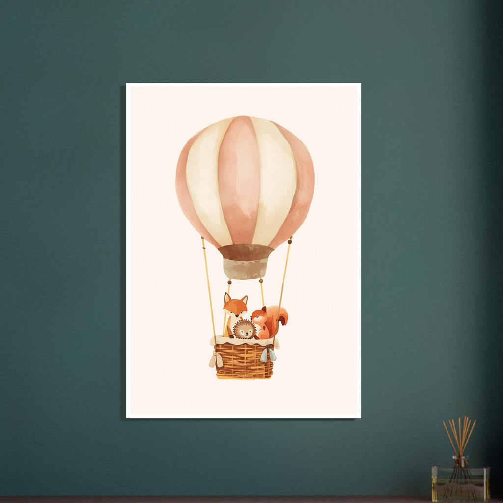 Peach and cream hot air balloon carrying a fox, hedgehog and squirrel in a woven basket against an ivory background.