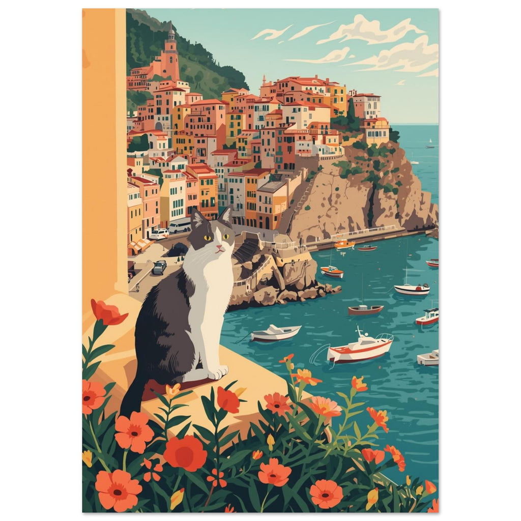 Grey and white cat on a flower-lined ledge above a teal harbour, small boats and colourful hillside buildings.