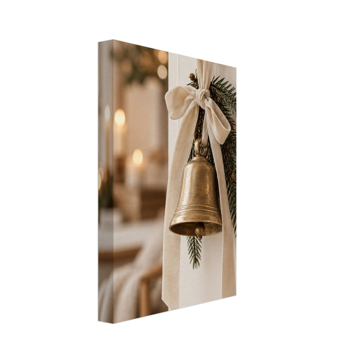 Golden bell hanging from a cream bow on a wooden peg, with evergreen sprigs and blurred candlelight behind.