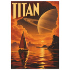 Sailboat on orange water beneath a giant ringed planet, framed by clouds and rocky shores, with TITAN lettering above.