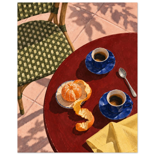 Two blue coffee cups, a peeled orange, spoon and yellow cloth on a red table beside a green woven chair and pink tiles.