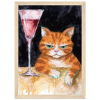 Ginger cat with green eyes resting its white paws on a golden table beside a tall glass of pink liquid, on black.