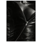 Black and white close-up of an open leather jacket with a diagonal metal zip and an exposed neckline.
