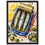 Three sardines in an open blue tin, one wearing a red party hat, surrounded by lemon wedges, olives and striped cloth.