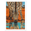 Zebra bending to drink from turquoise water, with its striped reflection below and orange earth behind.