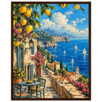 Lemon branches above a seaside terrace with a table, chairs and resting cat, overlooking sailboats and a coastal village.