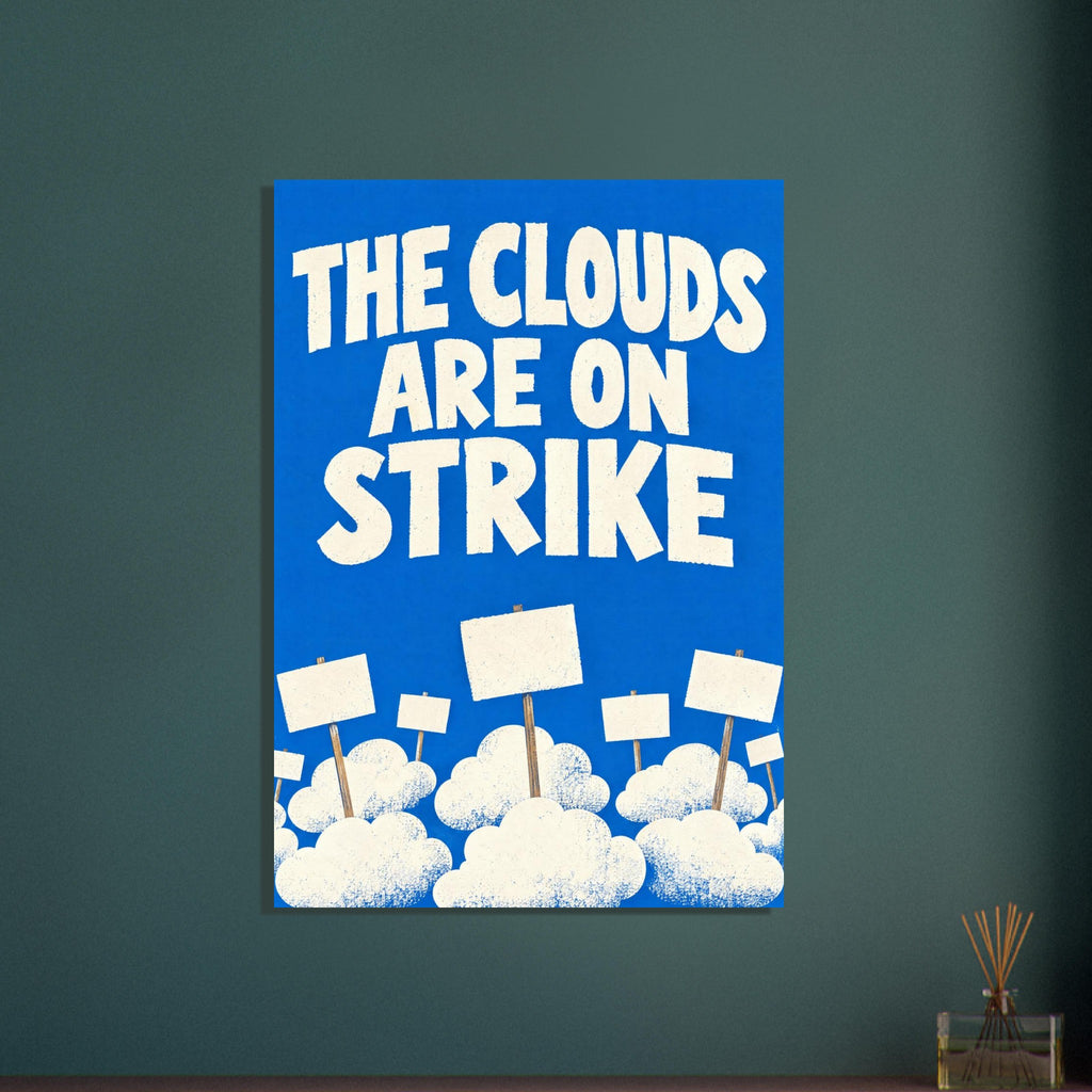 Cream text reading ‘The Clouds Are On Strike’ above clouds holding blank placards against a vivid blue background.