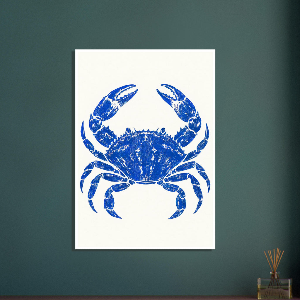 Ultramarine blue crab with raised claws and distressed detailing, centred on a warm cream background.
