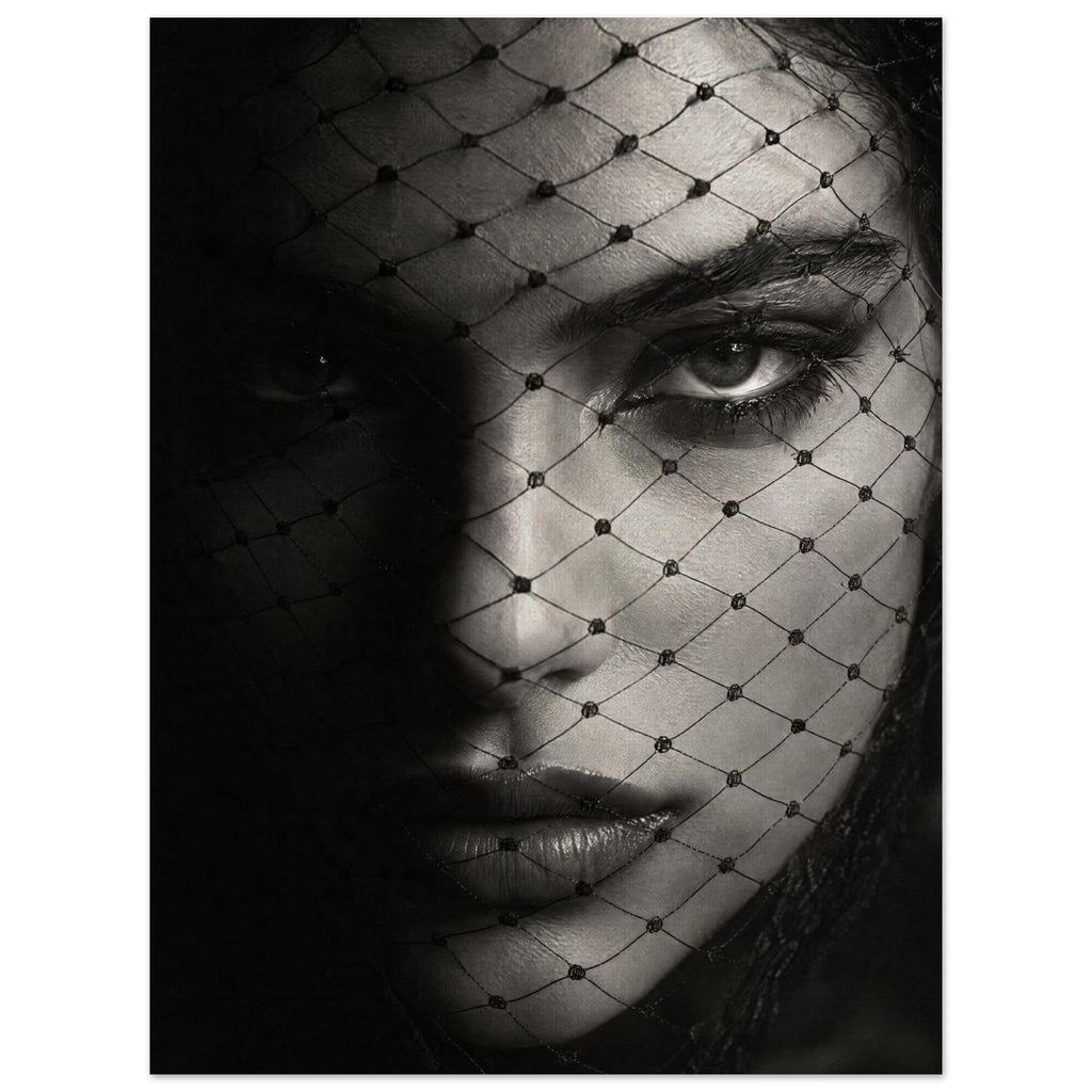Woman's face behind a diamond-patterned net veil, with one eye brightly lit and the other in deep shadow, in black and white.