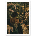 Woman in a gold dress holding a coupe glass, seated among pale orchids and dark foliage beneath a glasshouse roof.