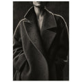 The Oversized Lapel, a chin-to-hip photograph of a model in a wool coat with a brightly outlined shoulder against charcoal sh