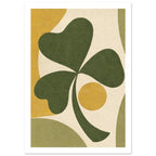 Green three-leaf shamrock with a curved stem, yellow circle and flowing mustard and muted green shapes on cream.