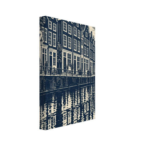 Gabled canal houses in navy and cream, with a street lamp, bicycles, an arched bridge and rippling reflections.
