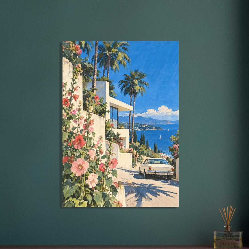 Pink hollyhocks beside a cream villa, with palm trees, a vintage car and a blue sea backed by distant mountains.