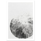 Textured black and grey circular impression fading into a white background, with cracks and radiating marks.