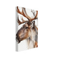 Reindeer facing left with large branching antlers, painted in brown and grey watercolour with splashes on white.