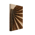Folded brown cardboard fans out from a vertical corrugated edge, with ragged cream edges and deep shadows.