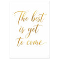 The words “The best is yet to come” in flowing gold-coloured script across three lines on a white background.