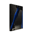 Cobalt Stockings, cropped legs in blue tights and black shoes forming an angular pose against a charcoal studio background.