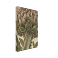 Flowering artichoke with green bracts, purple florets and jagged leaves on a textured beige background.