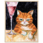 Ginger cat with green eyes resting its white paws on a golden table beside a tall glass of pink liquid, on black.