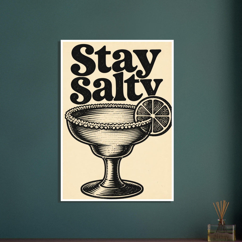 Stay Salty lettering above a salt-rimmed cocktail glass with a citrus slice, drawn in textured black on cream.