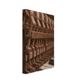 Piano interior with rows of felt-covered hammers, wooden levers and black and cream keys, rendered in textured browns.