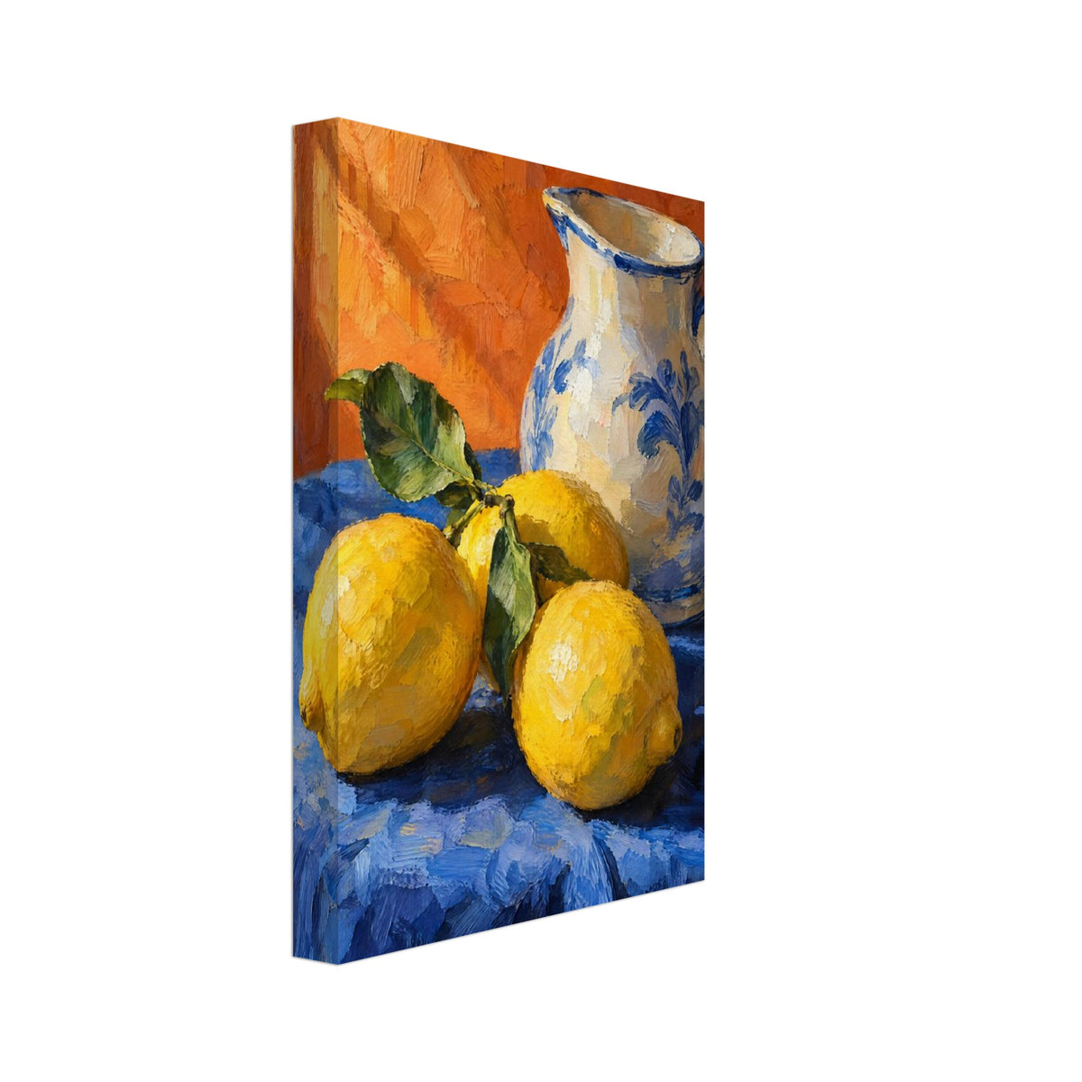 Three yellow lemons with green leaves beside a cream and blue floral jug on blue cloth against an orange background.