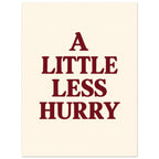 A Little Less Hurry in bold burgundy serif capitals, arranged over four centred lines on a cream background.