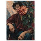 Seated dark-haired man in a burgundy shirt, with a large peach dahlia covering part of his face and leafy stems beside him.