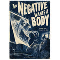 Skeletal creature emerging from a hanging sheet towards a frightened person, with cream horror-film lettering on navy.