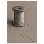 Wooden spool wrapped in pale thread, with a loose strand curling across a textured taupe background.