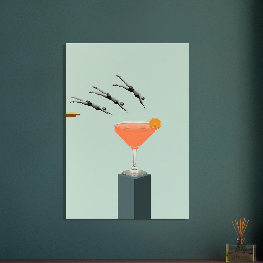 Three monochrome divers leap towards a giant orange cocktail with an orange slice on a dark plinth against pale mint.