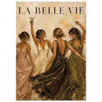 Four women in flowing evening dresses dancing beneath La Belle Vie lettering, one raising a glass, on a beige background.