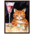 Ginger cat with green eyes resting its white paws on a golden table beside a tall glass of pink liquid, on black.