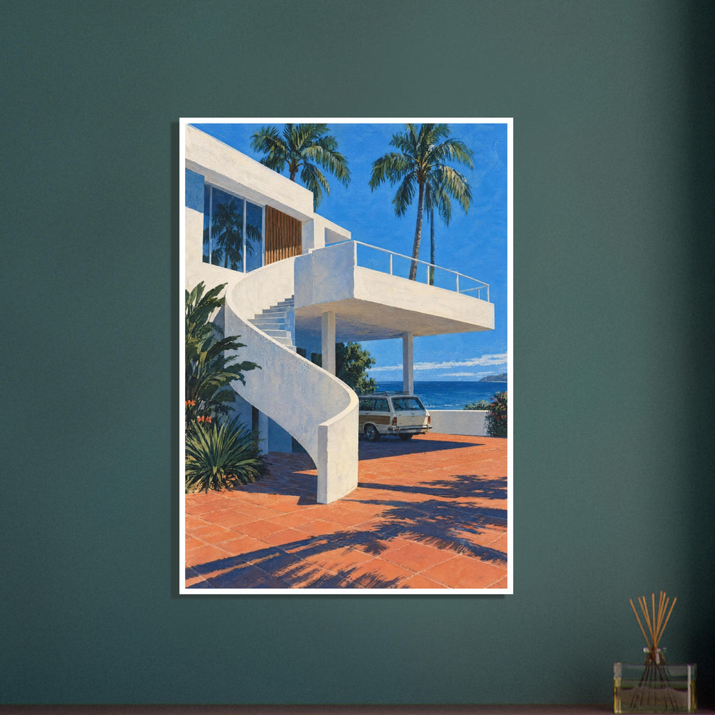 White coastal villa with a curved staircase, palm trees, a parked estate car and terracotta paving beside blue sea.
