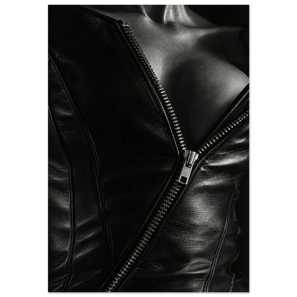 Black and white close-up of an open leather jacket with a diagonal metal zip and an exposed neckline.