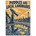 Viewing telescope beside a puddle reflecting a city skyline, with navy text reading “Puddles Are Local Landmarks”.