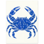 Ultramarine blue crab with raised claws and distressed detailing, centred on a warm cream background.