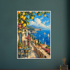 Lemon branches above a seaside terrace with a table, chairs and resting cat, overlooking sailboats and a coastal village.