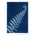 Pale blue fern frond with a curled tip extending diagonally across a textured deep blue background.
