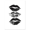 Three black and grey lip impressions stacked vertically on a white background, with textured edges and visible creases.