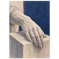 Pale painted hand resting on a rectangular block, with draped fabric at the wrist and a deep blue background.